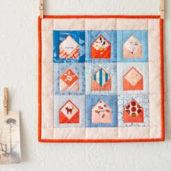 Envelopes Quilt Pattern -Qbpn FussyCutEnvelopesquilt CarolynFriedlander square2 1024x1024 47766b22 d2fe 4de1 90a7 32d45148c73c